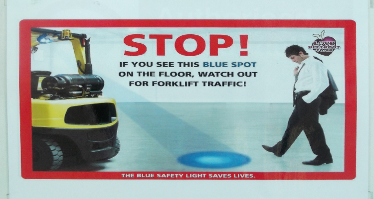 Blue spot warning system for forklift trucks